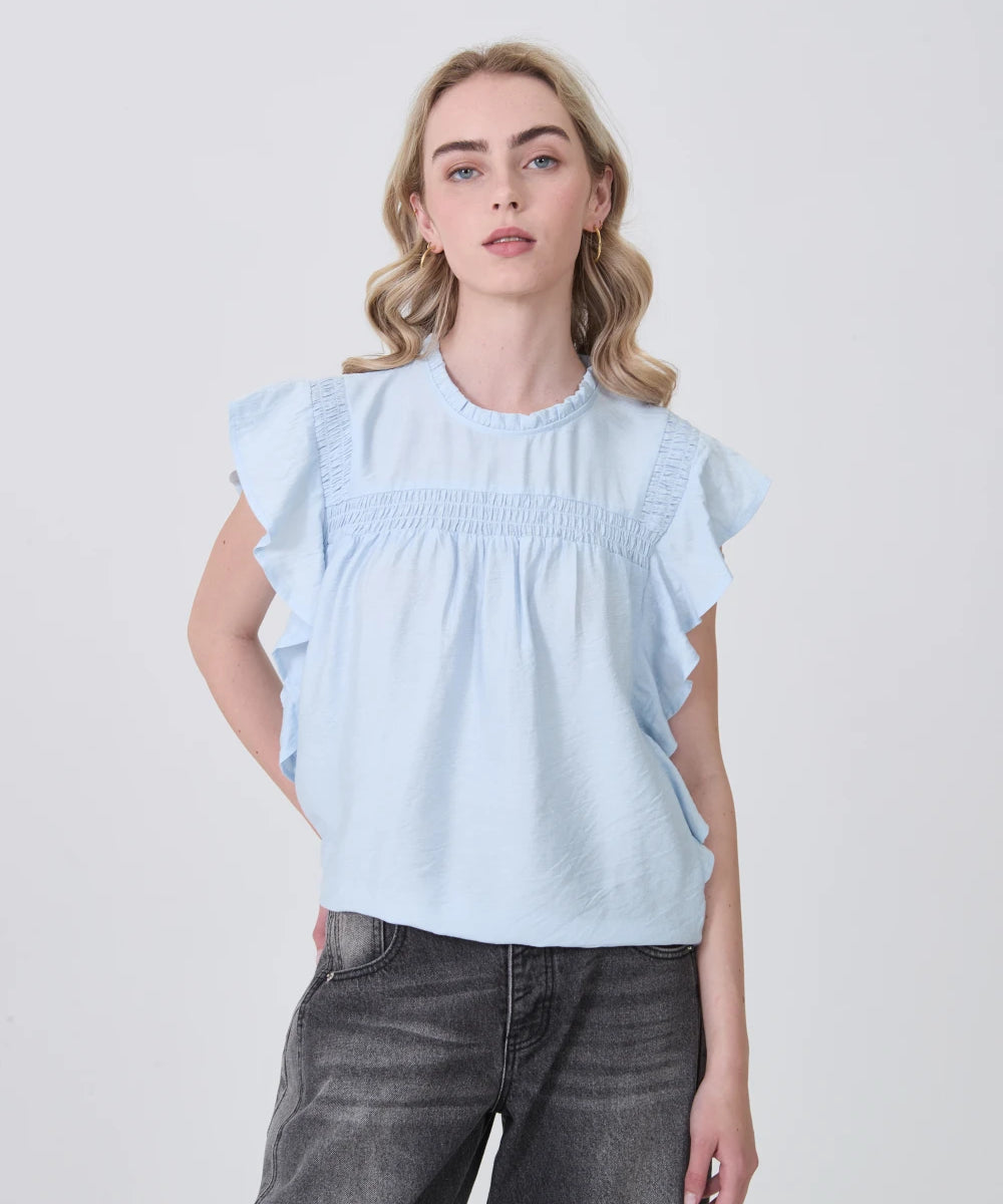 blusa-tursi-celeste-claro.webp